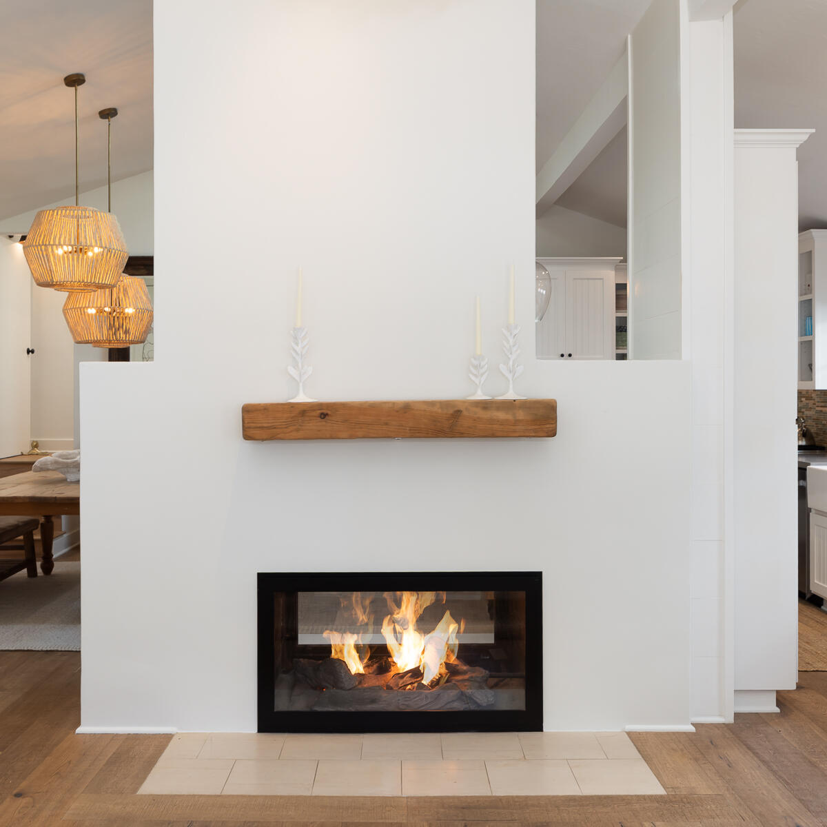 420 Seaview Road Montecito, CA 93108 - Photo 8 of 26 a room with a fireplace and a potted plant