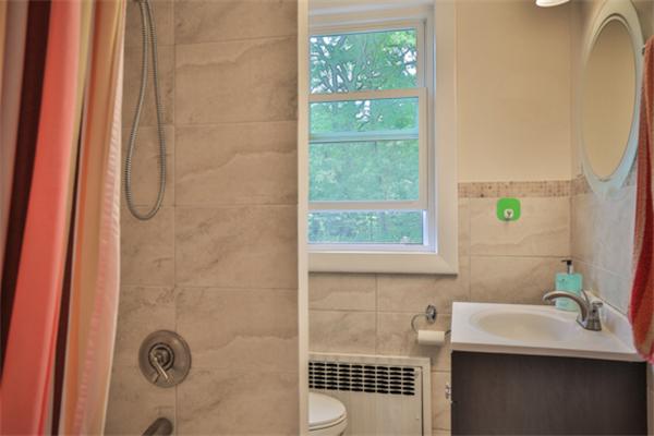 141 Ridge Street Winchester, MA 01890 - Photo 9 of 20 a bathroom with a sink and a mirror