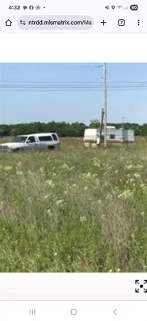 a black and white photo of a field