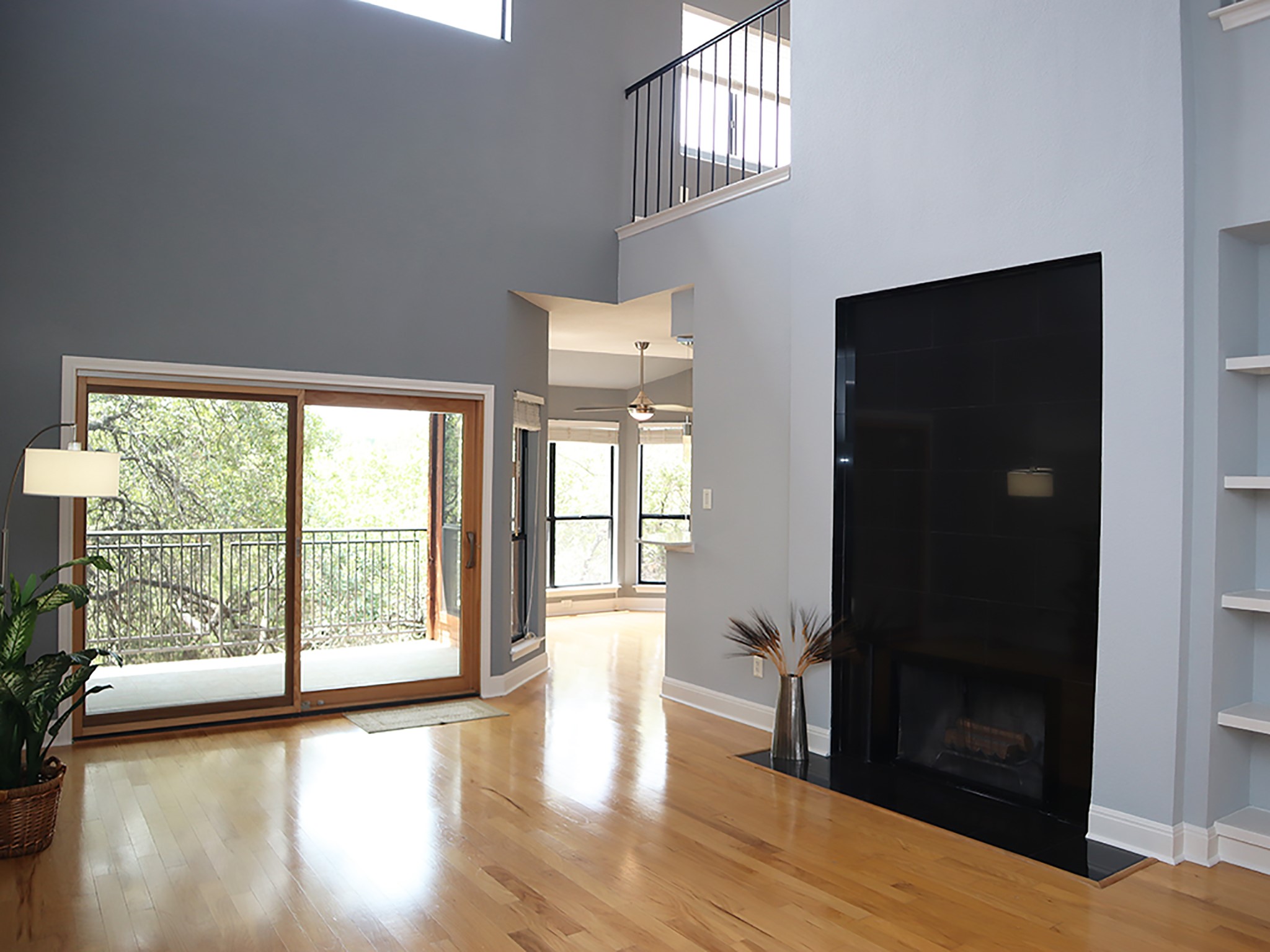 4711 Spicewood Springs Road, Unit 226 Austin, TX 78759 - Photo 1 of 1 Like all Stillhouse Canyon condos, this home showcases its longest views right from the entry, through the sliding door at the far end of the living room, beyond the covered deck and into the trees.