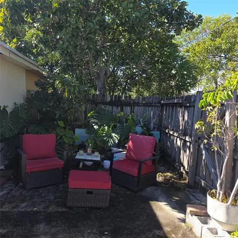 a view of a chairs in patio