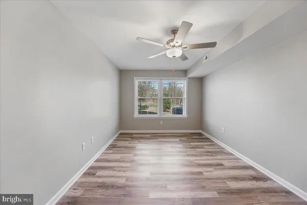 a view of an empty room with window
