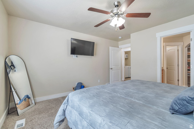 13038 Tower Ridge Drive Riverton, UT 84096 - Photo 14 of 30 Carpeted room featuring a ceiling fan with light fixture, neutral wall paint, and white trim