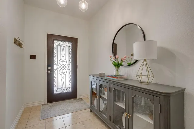 a view of entryway with kitchen