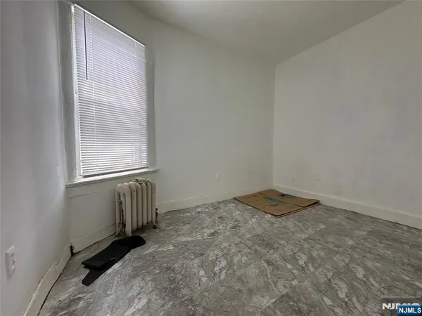 a view of a room with a window