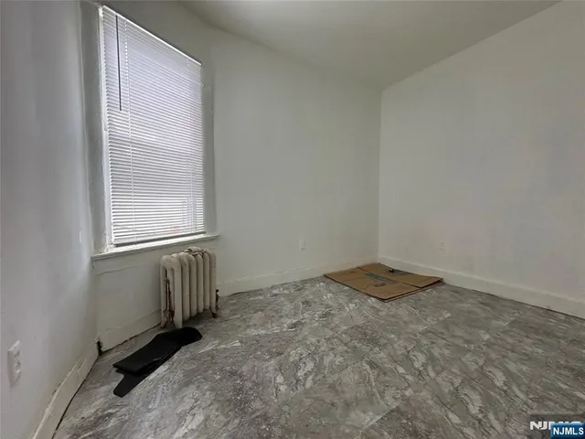 a view of a room with a window