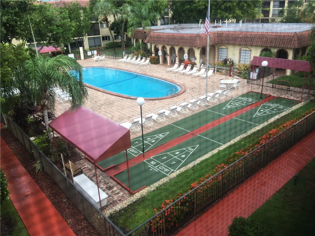 259 South Cypress Road, Unit 546 Pompano Beach, FL 33060 - Photo 21 of 29 Pool & Grounds View