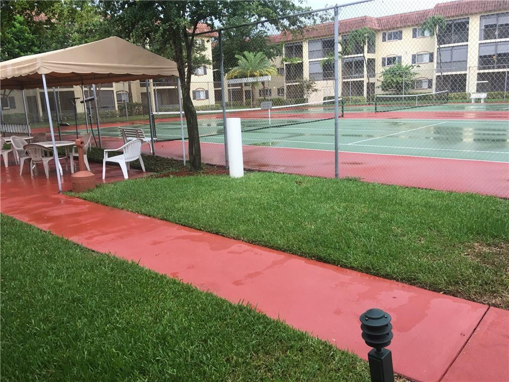 259 South Cypress Road, Unit 546 Pompano Beach, FL 33060 - Photo 24 of 29 Tennis Courts