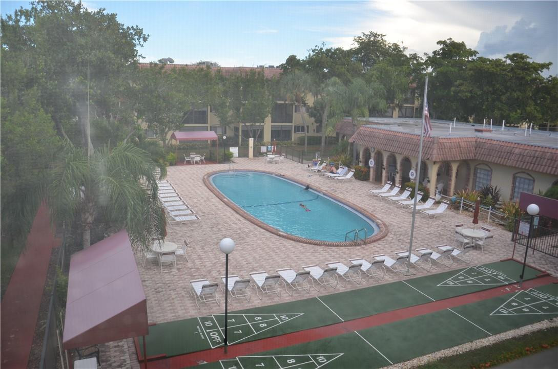 259 South Cypress Road, Unit 546 Pompano Beach, FL 33060 - Photo 3 of 29 Pool & Grounds View