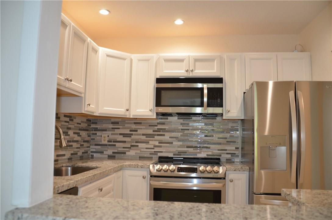 259 South Cypress Road, Unit 546 Pompano Beach, FL 33060 - Photo 9 of 29 Brand New Granite Kitchen