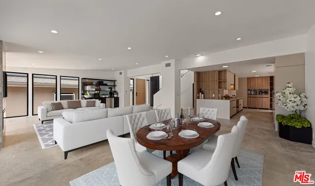 a living room with furniture and a table