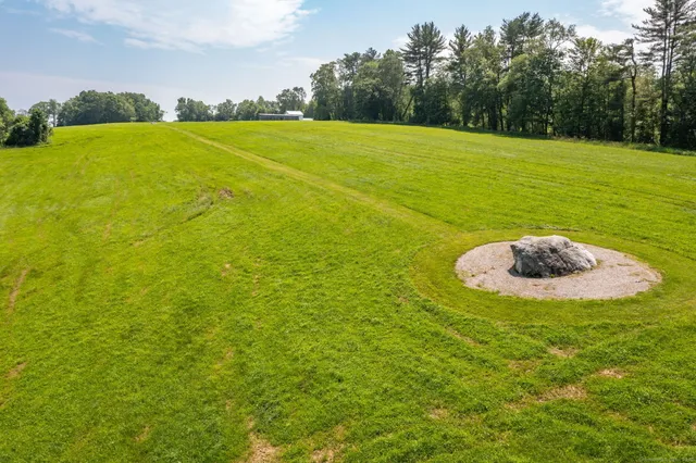 a view of a lake with a big yard