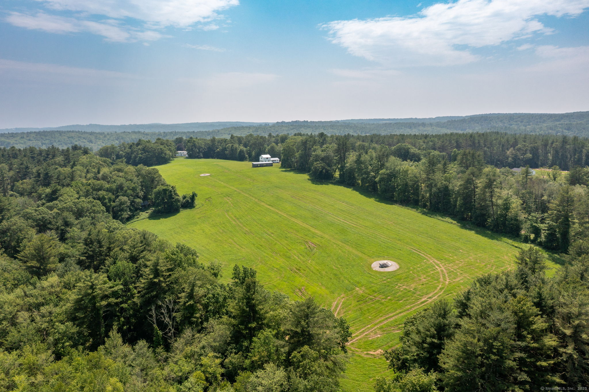 1669 Highway 169 Woodstock, CT 06281 - Photo 15 of 39 an aerial view of a residential houses with outdoor space and trees all around