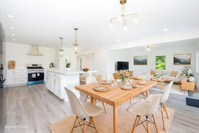 a view of a dining room with furniture
