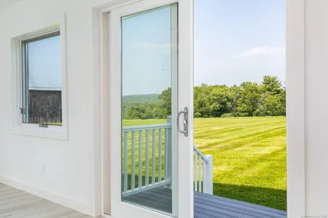 a bedroom with a bed and furniture
