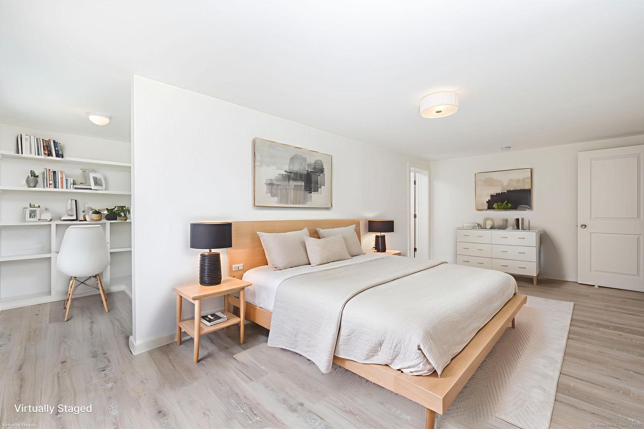 1669 Highway 169 Woodstock, CT 06281 - Photo 23 of 39 a bedroom with a bed and furniture