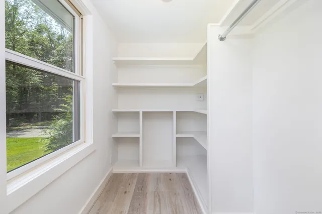 a bathroom with a bathtub and a sink