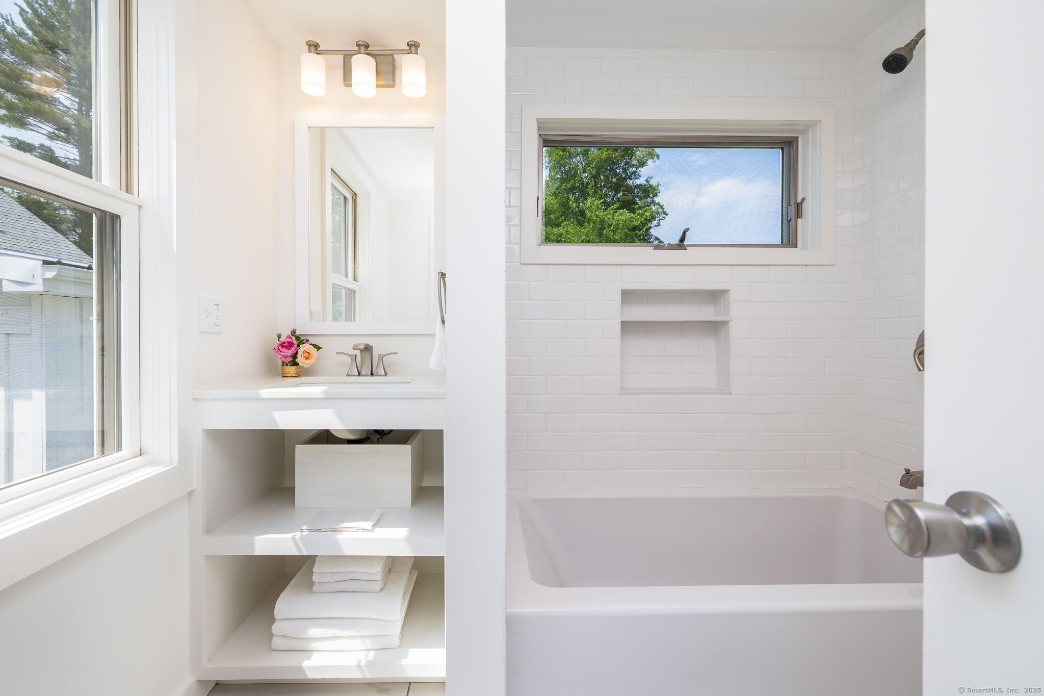 1669 Highway 169 Woodstock, CT 06281 - Photo 25 of 39 a bathroom with a bathtub and a sink
