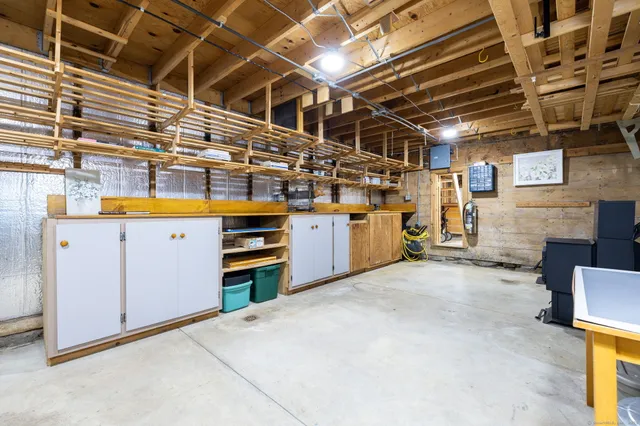 a view of a livingroom with furniture and a garage