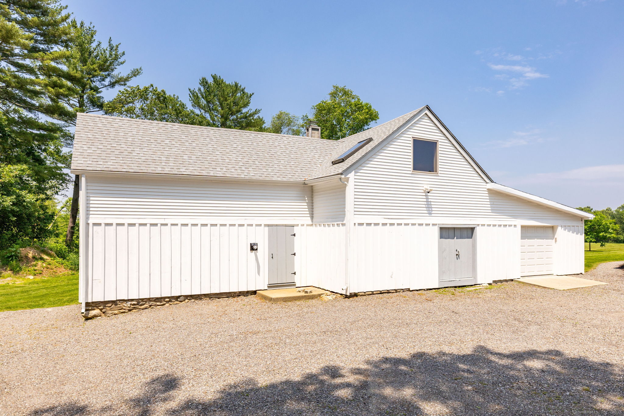 1669 Highway 169 Woodstock, CT 06281 - Photo 4 of 39 a view of garage and yard