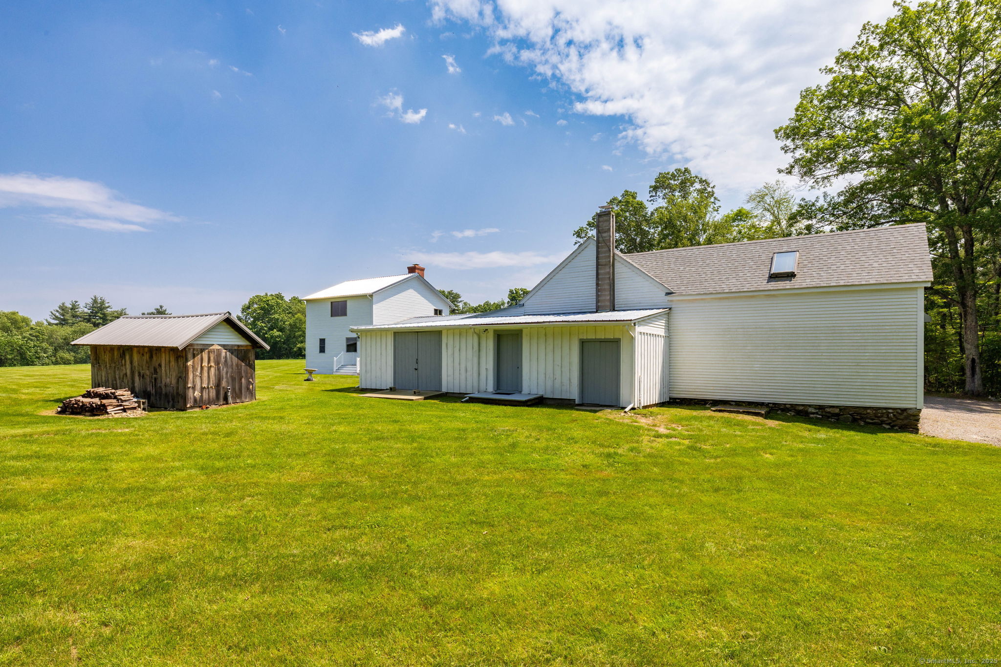 1669 Highway 169 Woodstock, CT 06281 - Photo 5 of 39 a view of a house with a yard