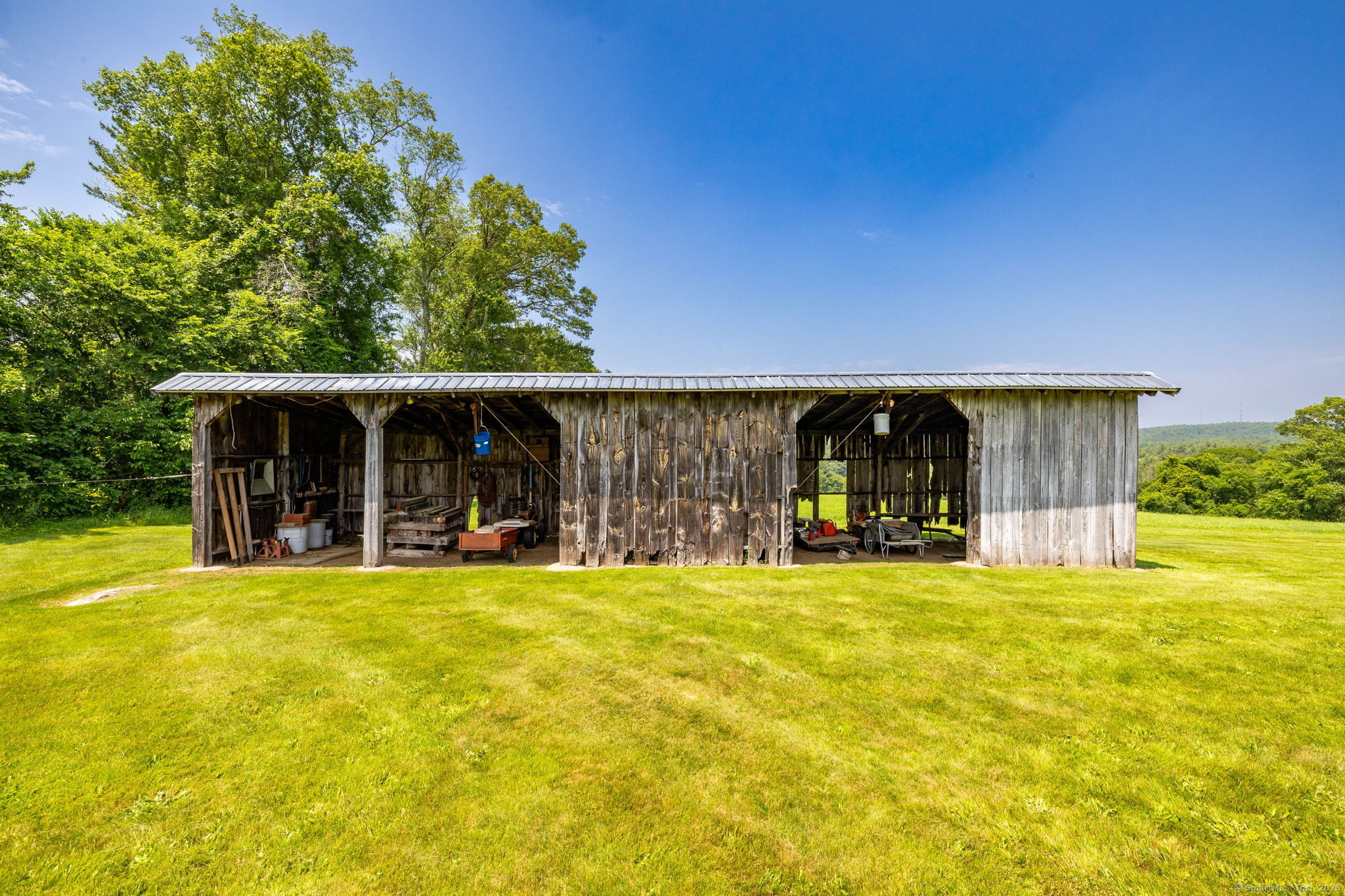 1669 Highway 169 Woodstock, CT 06281 - Photo 6 of 39 a view of a swimming pool with a patio