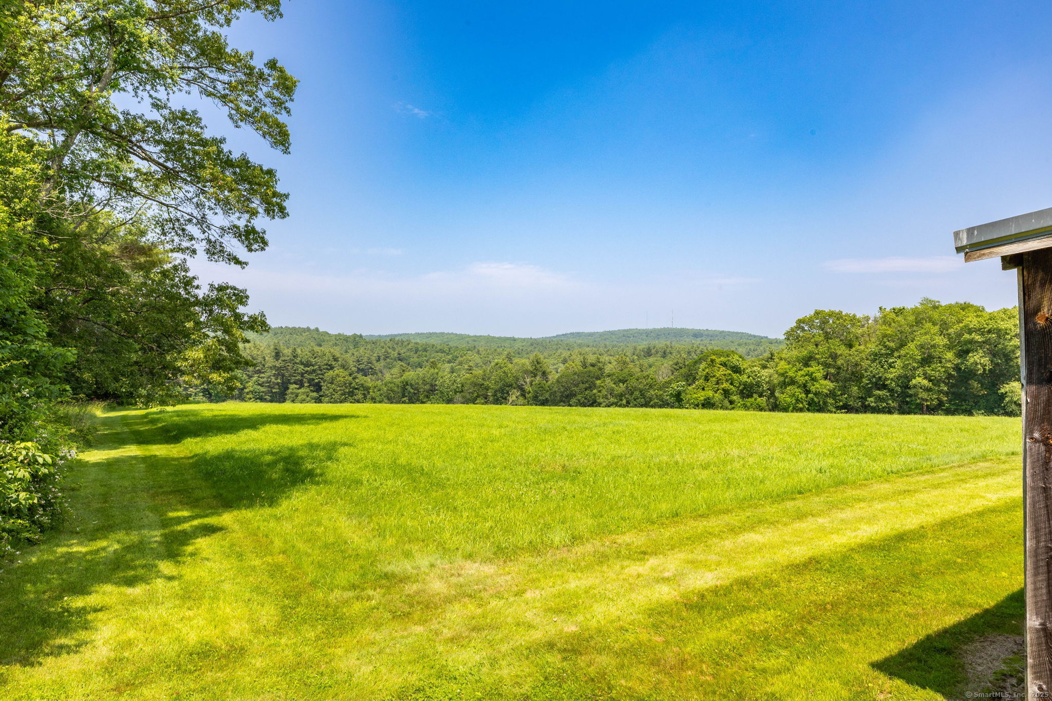 1669 Highway 169 Woodstock, CT 06281 - Photo 8 of 39 a view of an ocean from a yard
