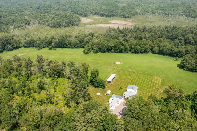 a view of a lake with a park