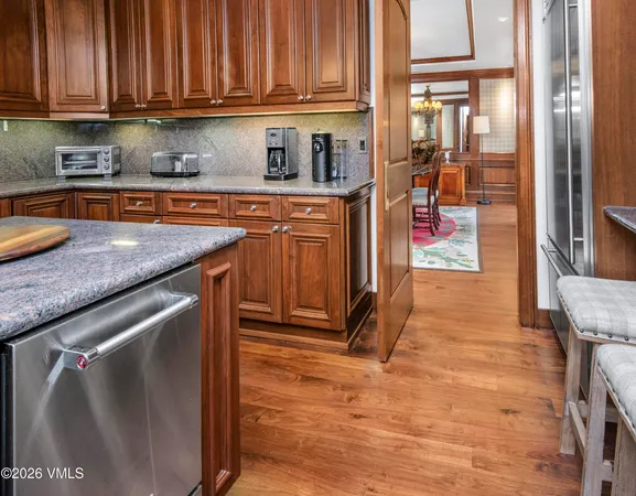 a bedroom with bed and a fireplace