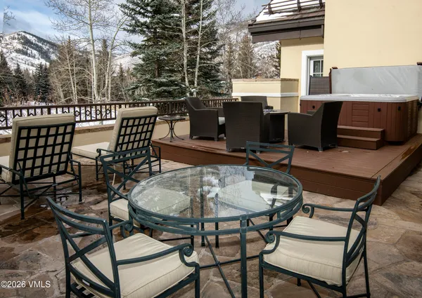 a bathroom with a toilet a sink and a mirror