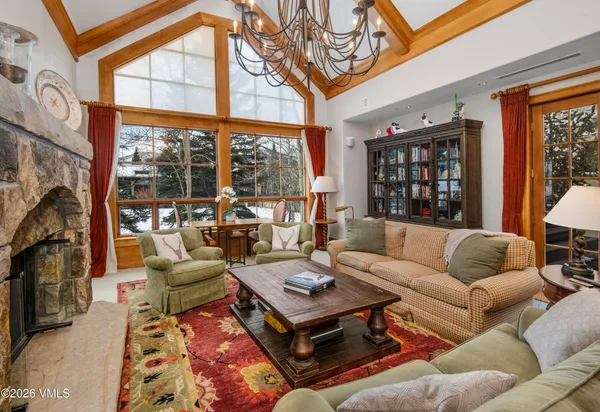 a bathroom with a sink vanity and shower