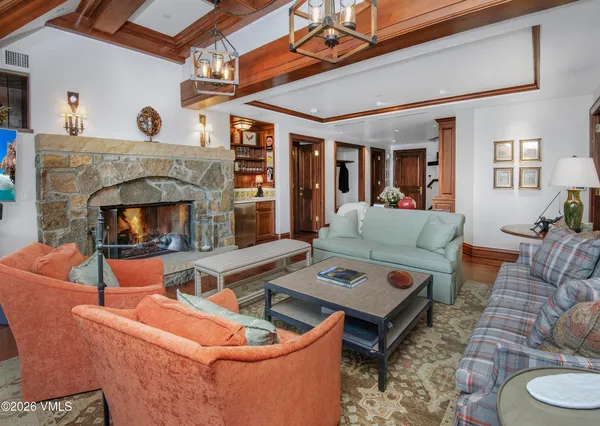a very nice looking dining room with a table and chairs