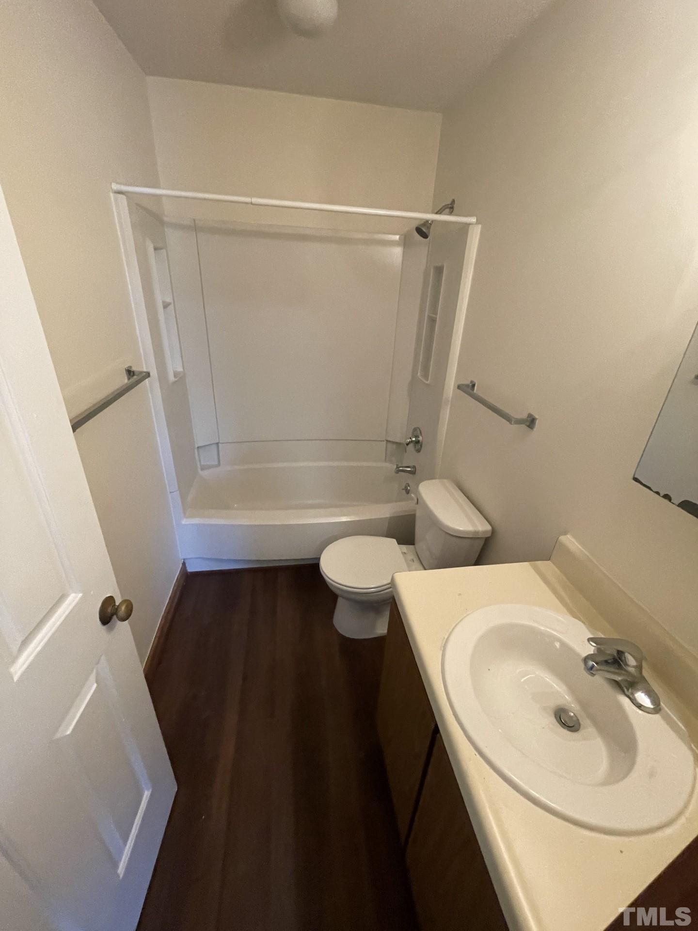 3511 Ivy Commons Drive, Unit 302 Raleigh, NC 27606 - Photo 9 of 9 a bathroom with a sink and toilet