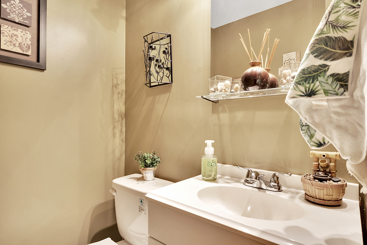 953 North Rohlwing Road, Unit 201A Addison, IL 60101 - Photo 14 of 20 a bathroom with a sink mirror and vanity