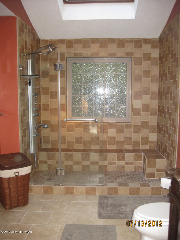 116 Grouse Road East Stroudsburg, PA 18301 - Photo 11 of 31 a bathroom with a toilet and a shower