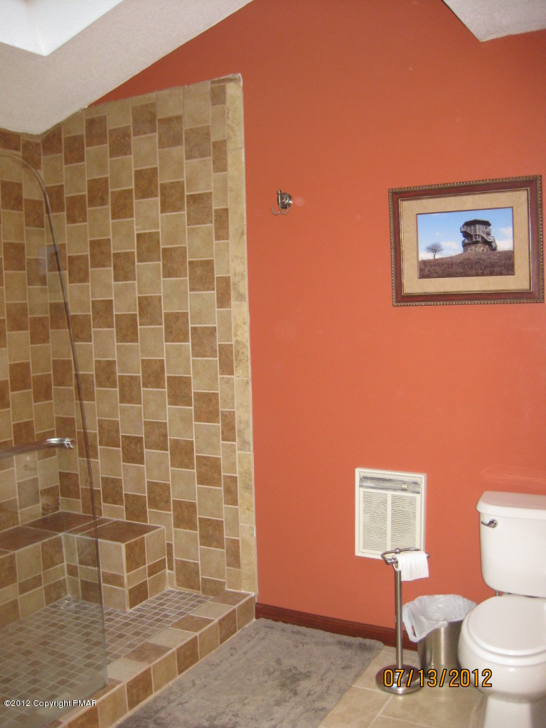 116 Grouse Road East Stroudsburg, PA 18301 - Photo 12 of 31 a bathroom with a toilet and a shower