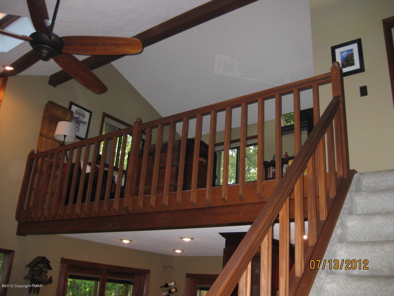 116 Grouse Road East Stroudsburg, PA 18301 - Photo 14 of 31 a view of staircase with lots of frames on wall and staircase