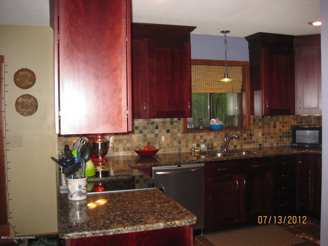 116 Grouse Road East Stroudsburg, PA 18301 - Photo 2 of 31 a kitchen with a sink and cabinets