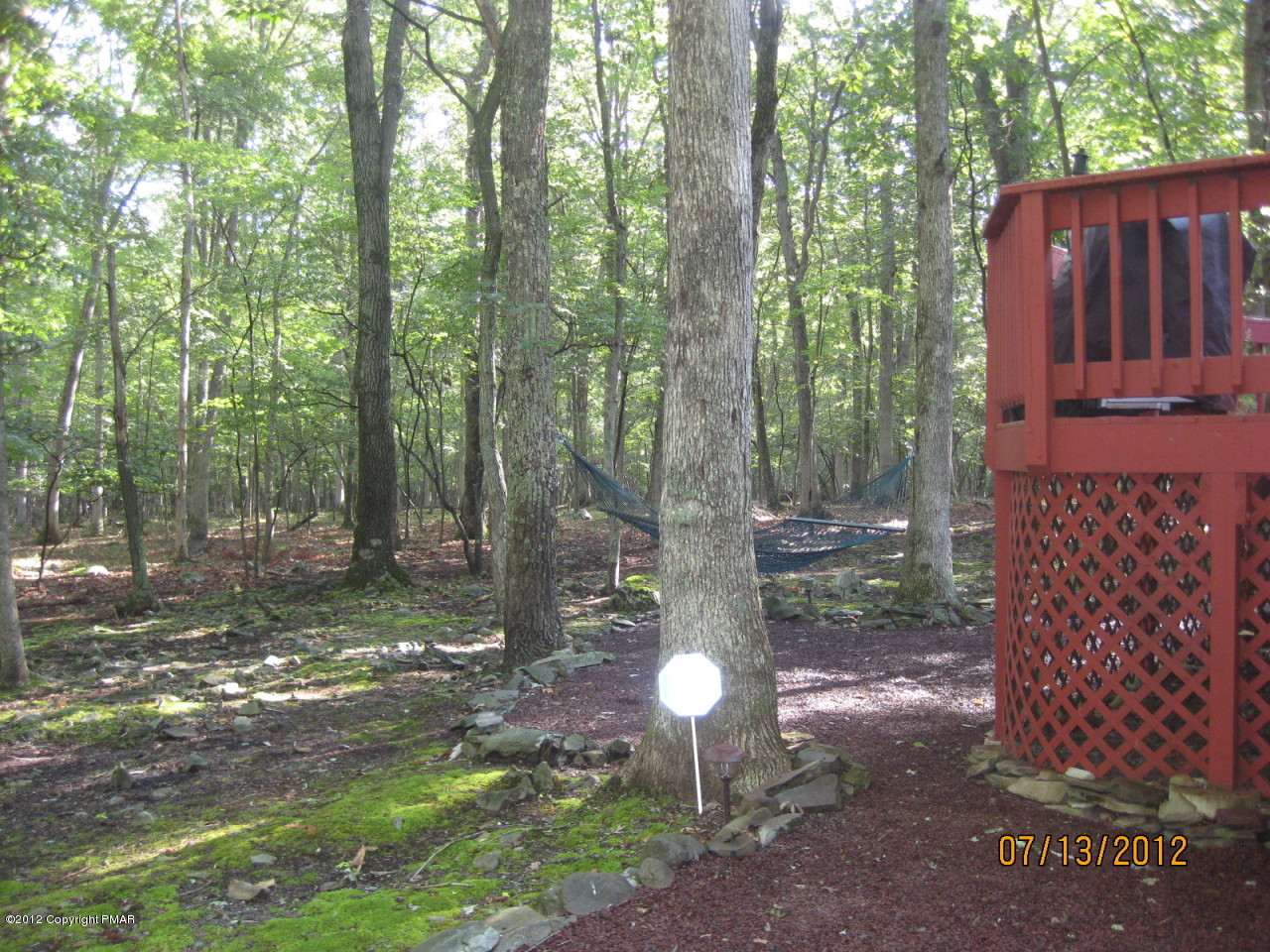 116 Grouse Road East Stroudsburg, PA 18301 - Photo 24 of 31 a backyard of a house with lots of green space