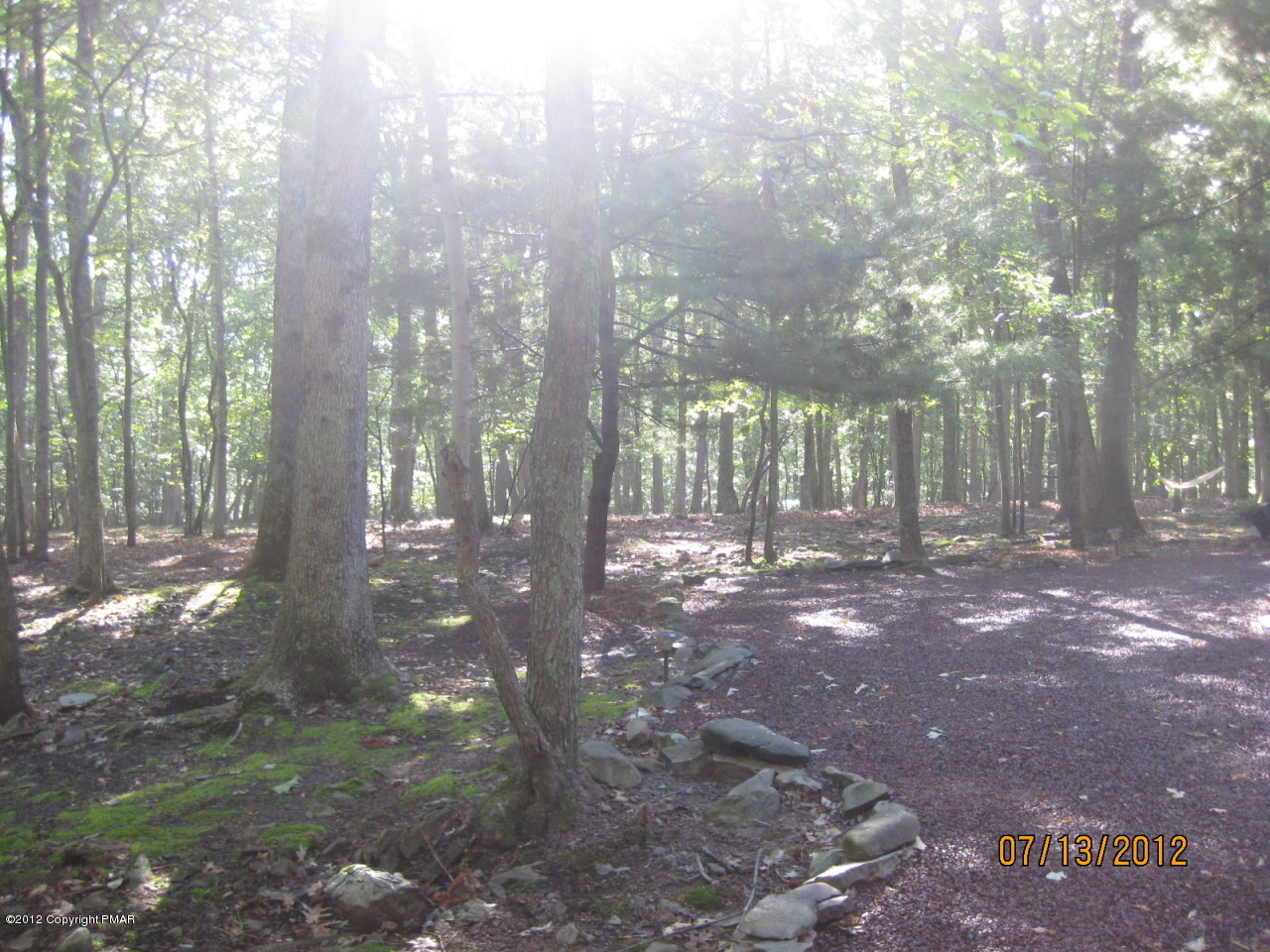 116 Grouse Road East Stroudsburg, PA 18301 - Photo 25 of 31 a view of a yard with trees in the background