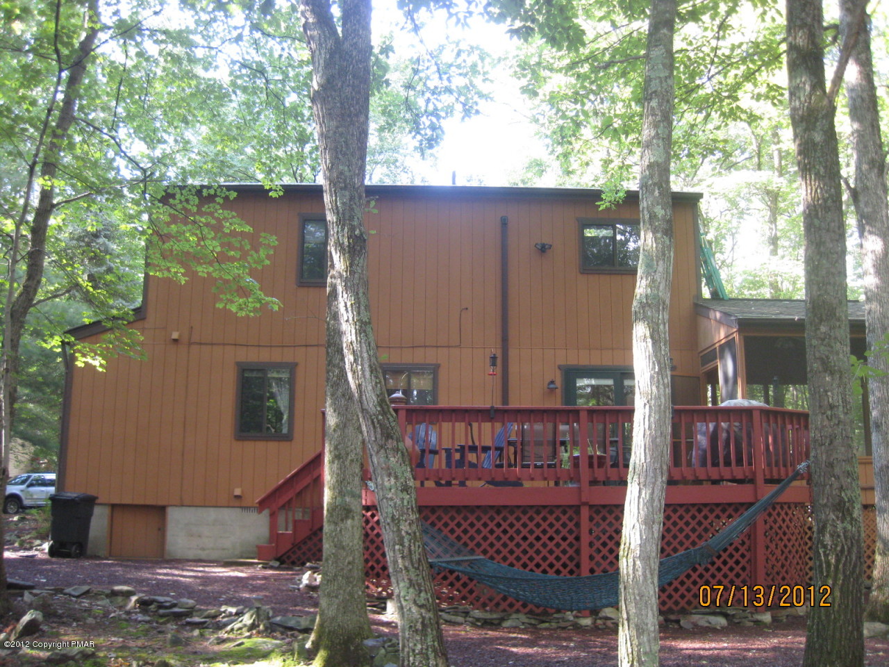 116 Grouse Road East Stroudsburg, PA 18301 - Photo 31 of 31 a view of a house with backyard and deck