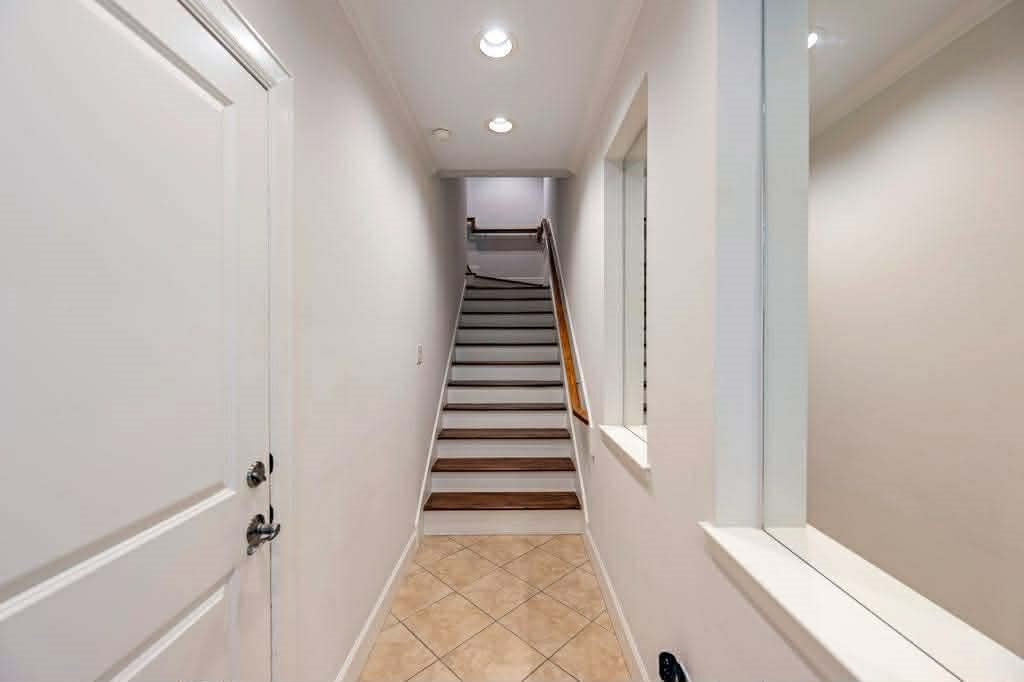 2210 Mid Lane, Unit 107 Houston, TX 77027 - Photo 14 of 15 a view of a hallway with entryway