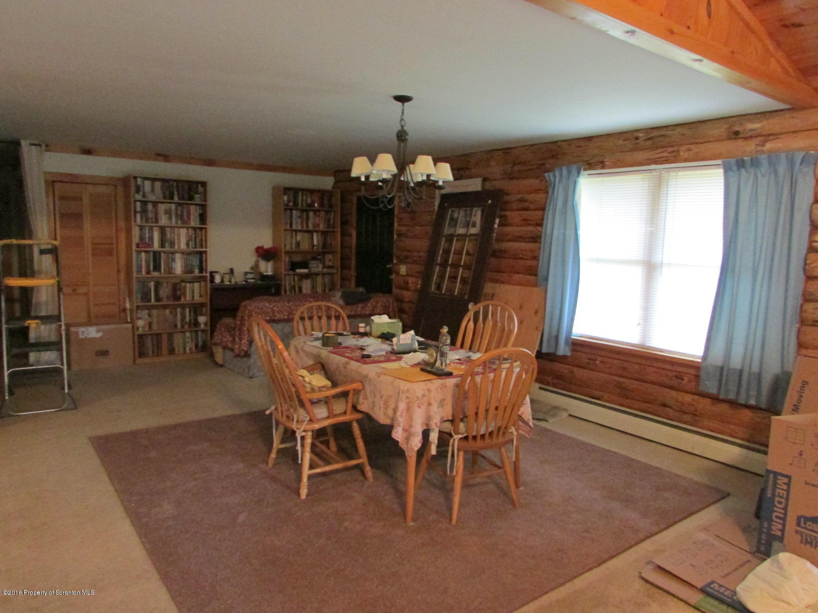 619 Litwin Road Meshoppen, PA 18630 - Photo 4 of 12 a dining room with a wooden table and chairs