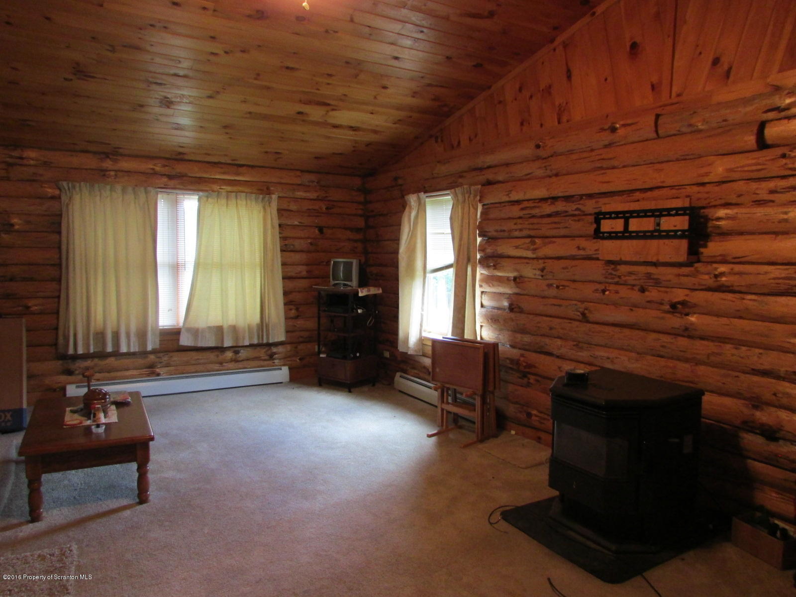 619 Litwin Road Meshoppen, PA 18630 - Photo 5 of 12 a view of livingroom with furniture and windows