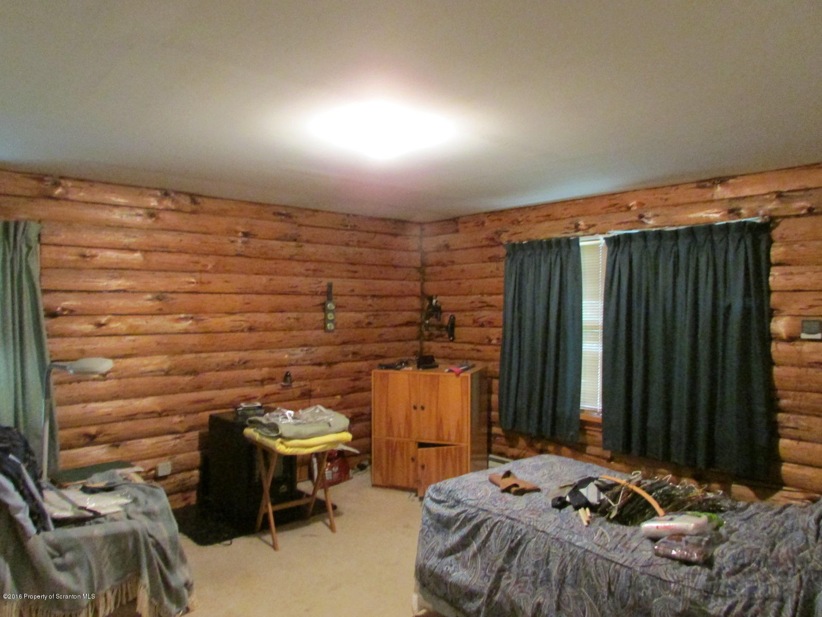 619 Litwin Road Meshoppen, PA 18630 - Photo 8 of 12 a bedroom with a bed and a closet