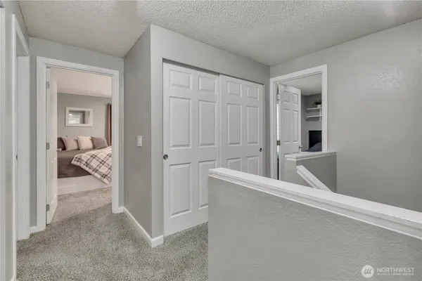 a view of a bedroom with closet