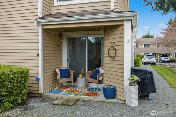 a view of a two chair in the patio