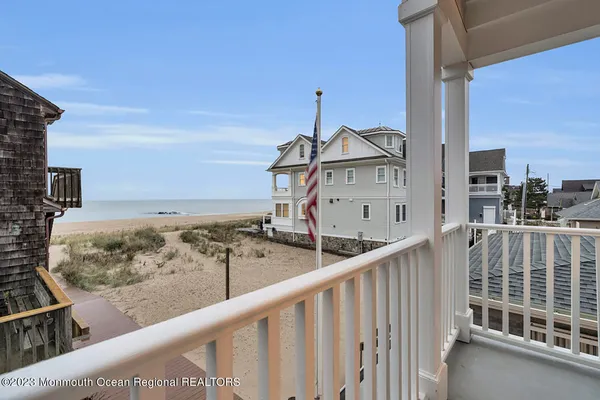 a view of balcony with furniture