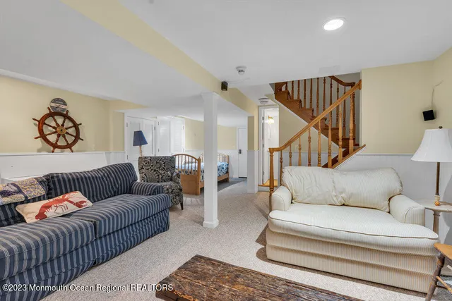 a living room with furniture and a couch