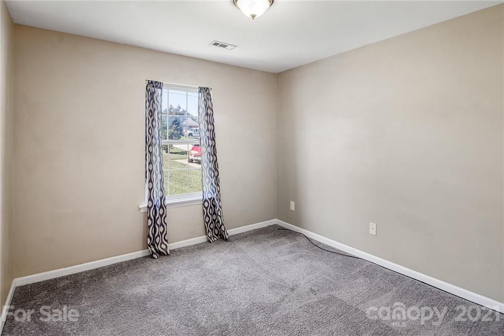 8577 Unity Church Road Denver, NC 28037 - Photo 23 of 33 an empty room with closet